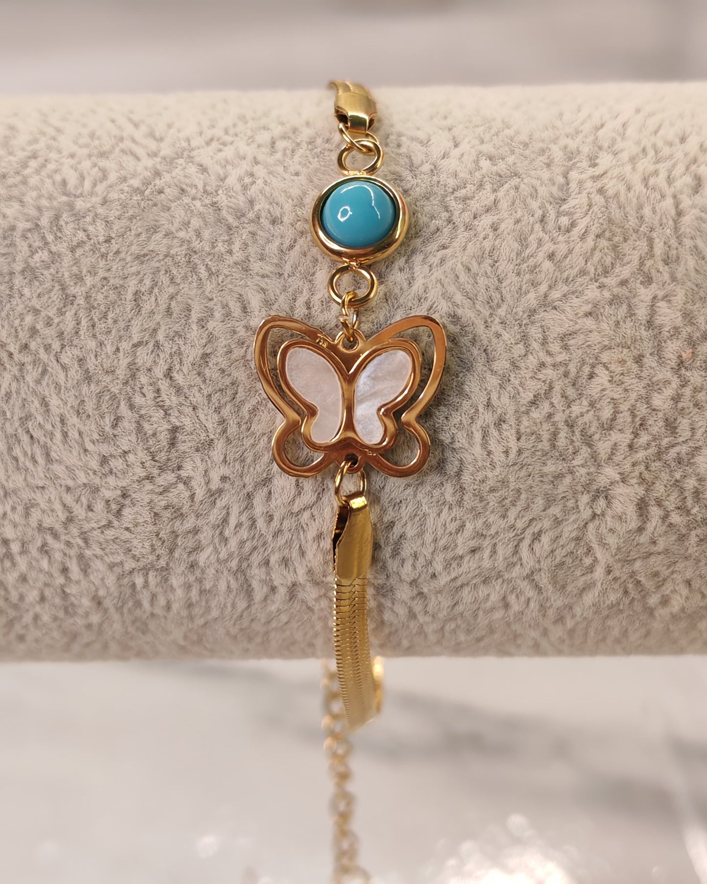 Gold Bracelet with Butterfly and Blue Stone