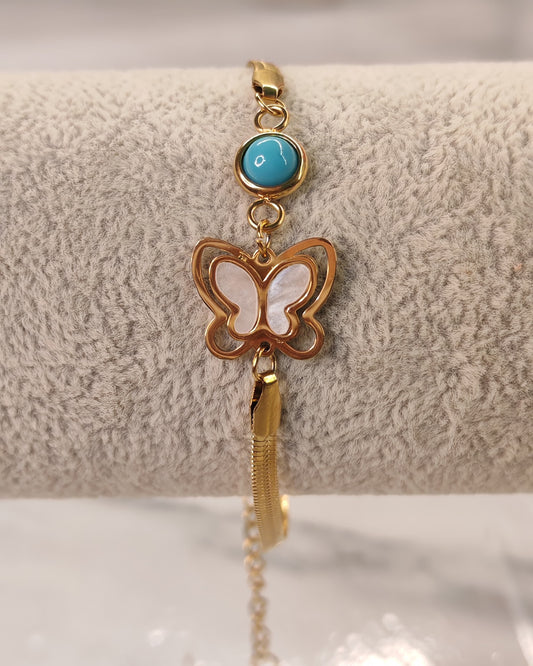 Gold Bracelet with Butterfly and Blue Stone
