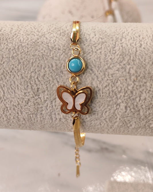 Gold Bracelet with Butterfly and Blue Stone