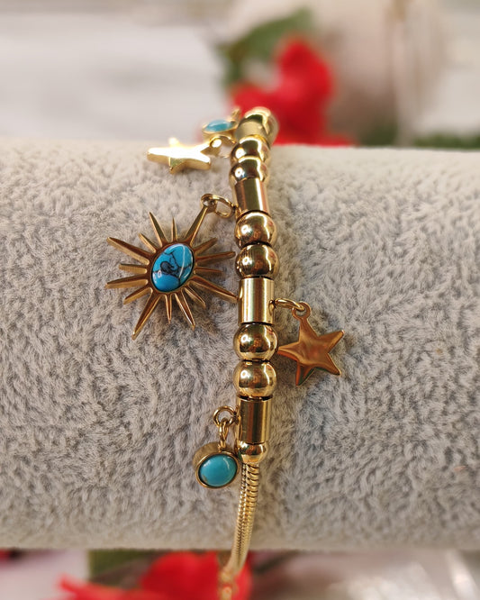 Gold Bracelet with Stars and Blue Stones